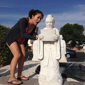Jennifer Pham with statue